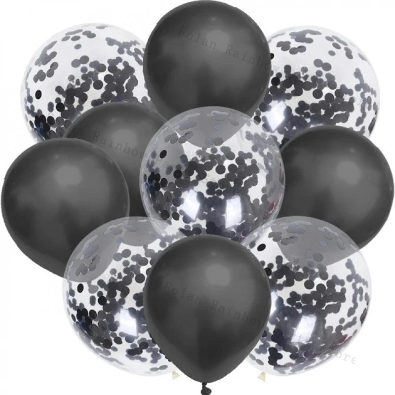 A collection of round balloons in silver and black with white confetti for parties