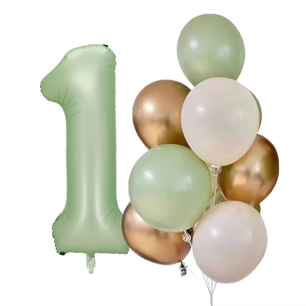 A cluster of olive green and gold foil balloons shaped like the number one.