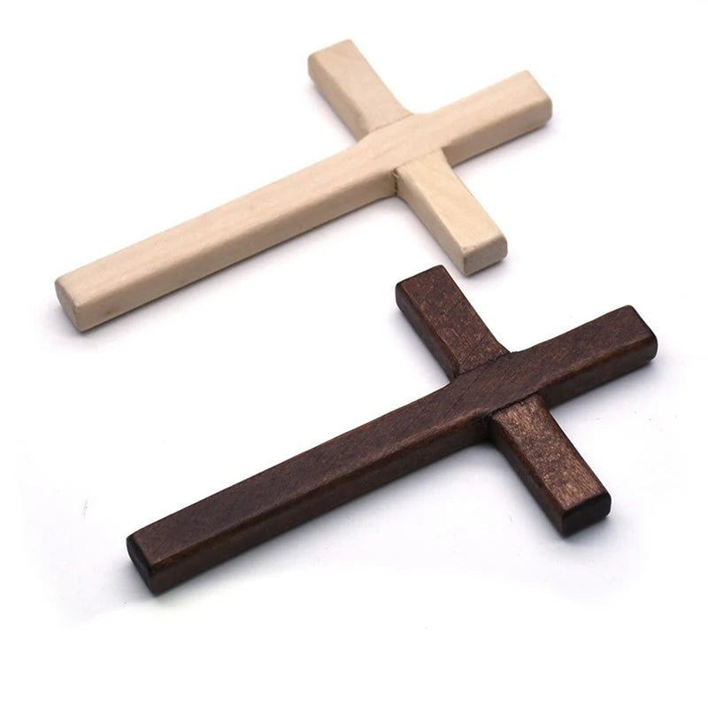 Handcrafted wooden wall cross with a two-tone finish, featuring light and dark wood tones.