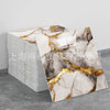 Stack of faux marble 3D self-adhesive wall tiles featuring white and gray marble patterns with gold veining