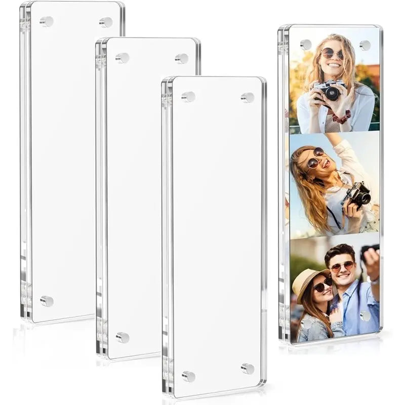 A set of four clear acrylic photo frames, including a vertical frame and three horizontal frames featuring different photos.
