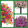 Artificial eucalyptus violet flowers in various shades of pink, red, yellow, and purple on a black stem.