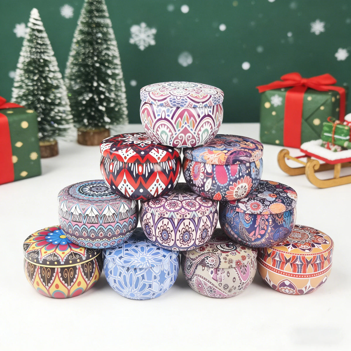 A stack of colorful aromatherapy soy wax candles with intricate patterns on a white surface.