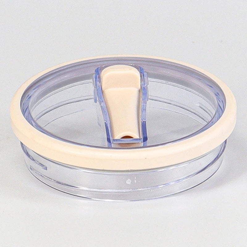 Clear plastic replacement lid with a beige silicone stopper for a tumbler cup.