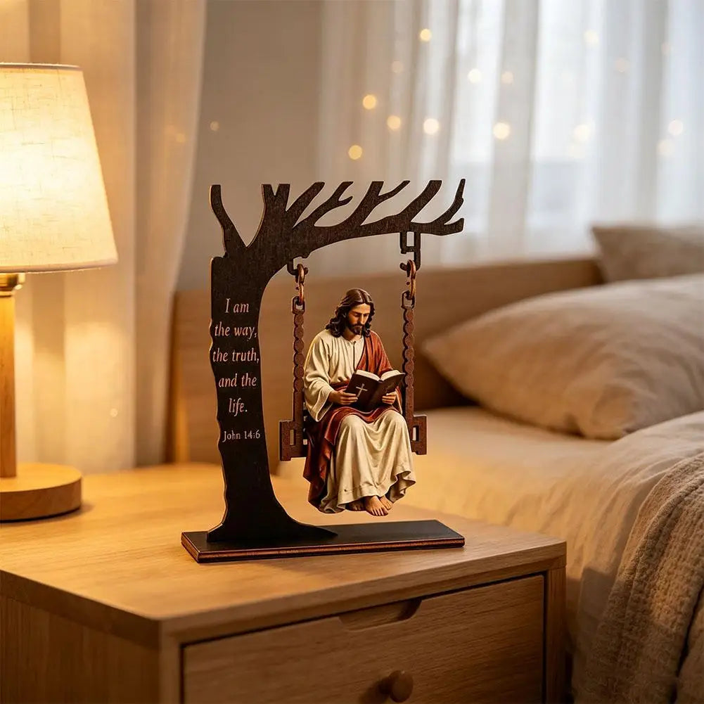 Wooden swing table décor featuring Jesus and a Bible verse on a bedside table.