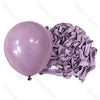 A bunch of lilac and purple latex balloons are shown, tied in ruffled bunches for baby shower or birthday décor.