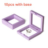 Purple floating shadow box jewelry display frame with 10 gift boxes and a base