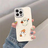 A hand holds a white phone case decorated with transparent DIY stickers featuring a ghost and pumpkins.
