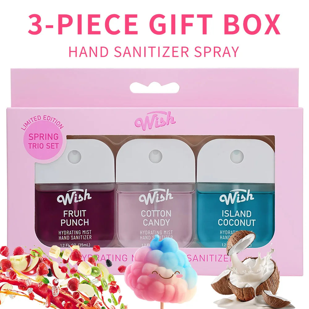 A pink gift box containing three Wish hand sanitizer sprays in fruit punch, cotton candy, and island coconut scents.