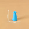 A small, bright blue miniature resin vase with a flared neck and rounded base.