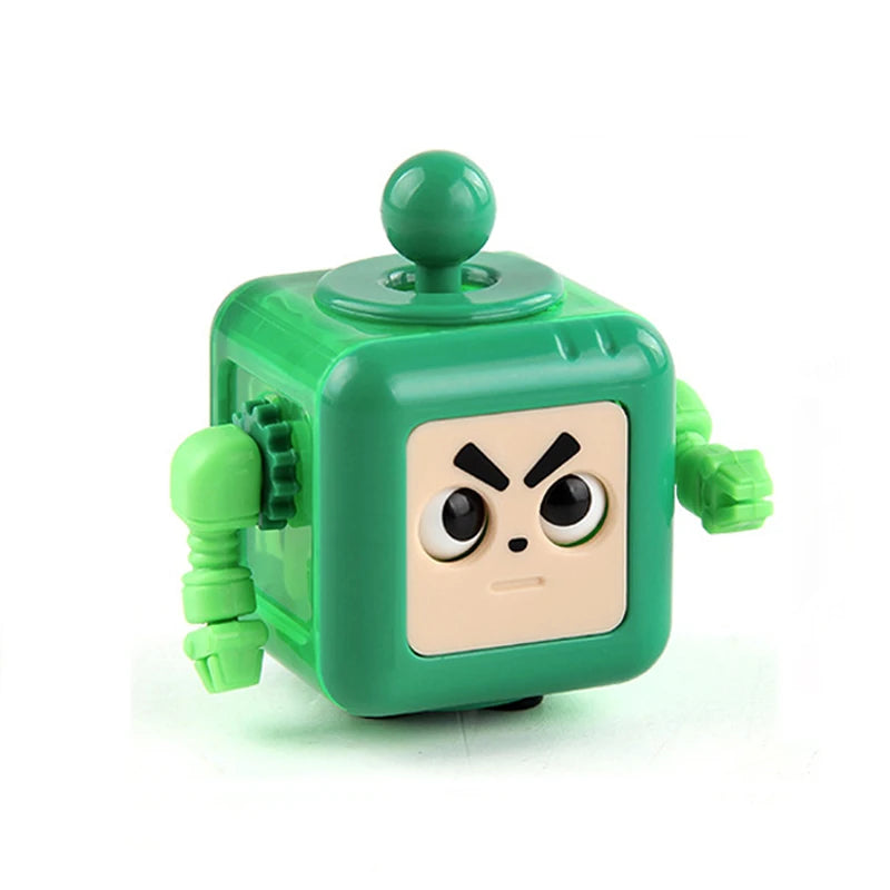 A green fidget cube with a square face and angry eyes, featuring a round top and small green appendages.