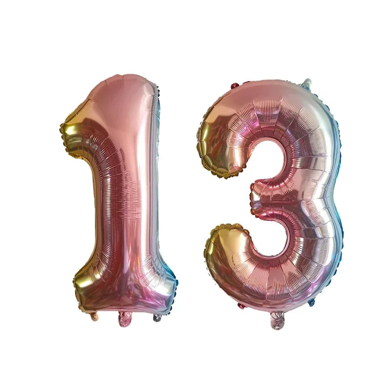 Silver and pink helium foil number balloons spelling out 13
