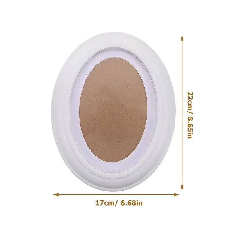 Elegant oval wooden wall photo frame with a light beige oval insert and white border