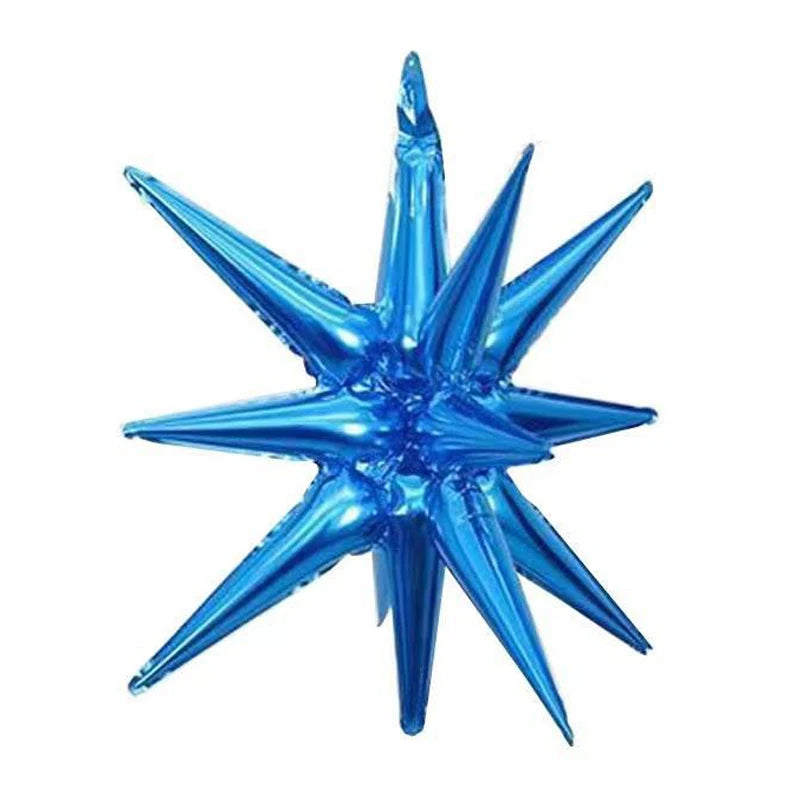 A blue star burst foil balloon with sharp points, used for party decor.