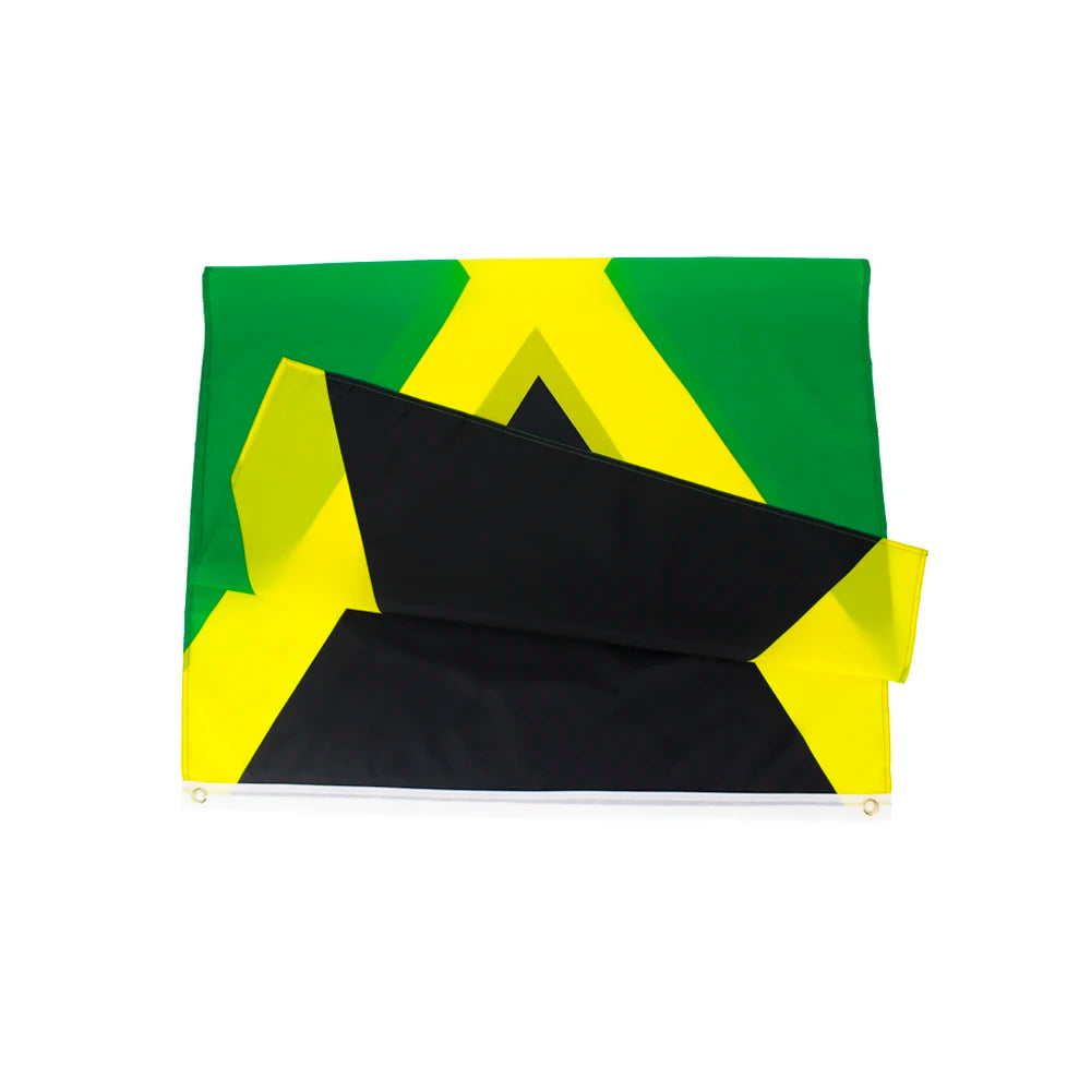 A vibrant tapestry featuring the Jamaican flag design in green, yellow, and black fabric.
