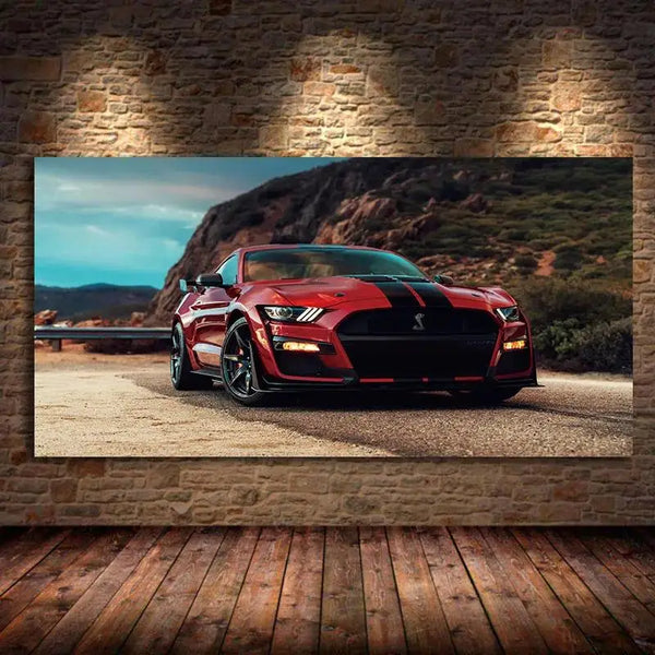 Red Ford Mustang Shelby GT canvas wall art parked on a dirt road with a stone wall background.
