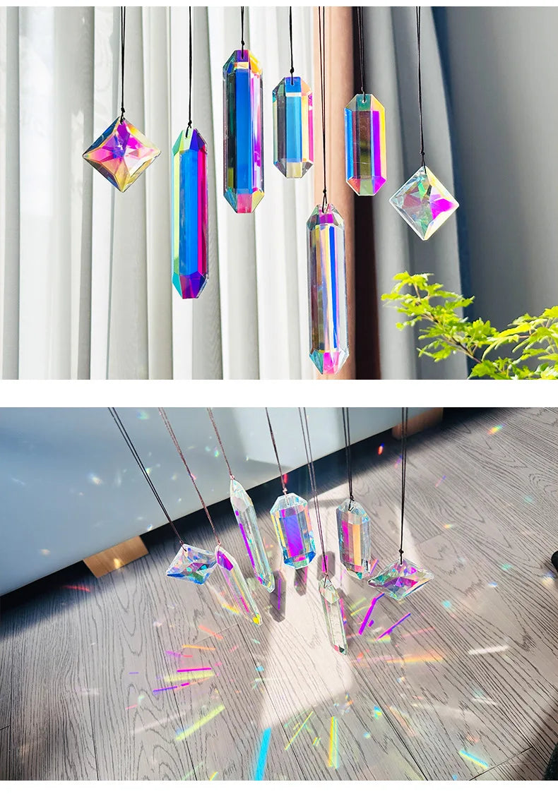 A collection of seven crystal prism sun catchers hanging in a vertical display against a light background.
