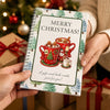 A gift card book with a festive design featuring Christmas elements and a greeting.
