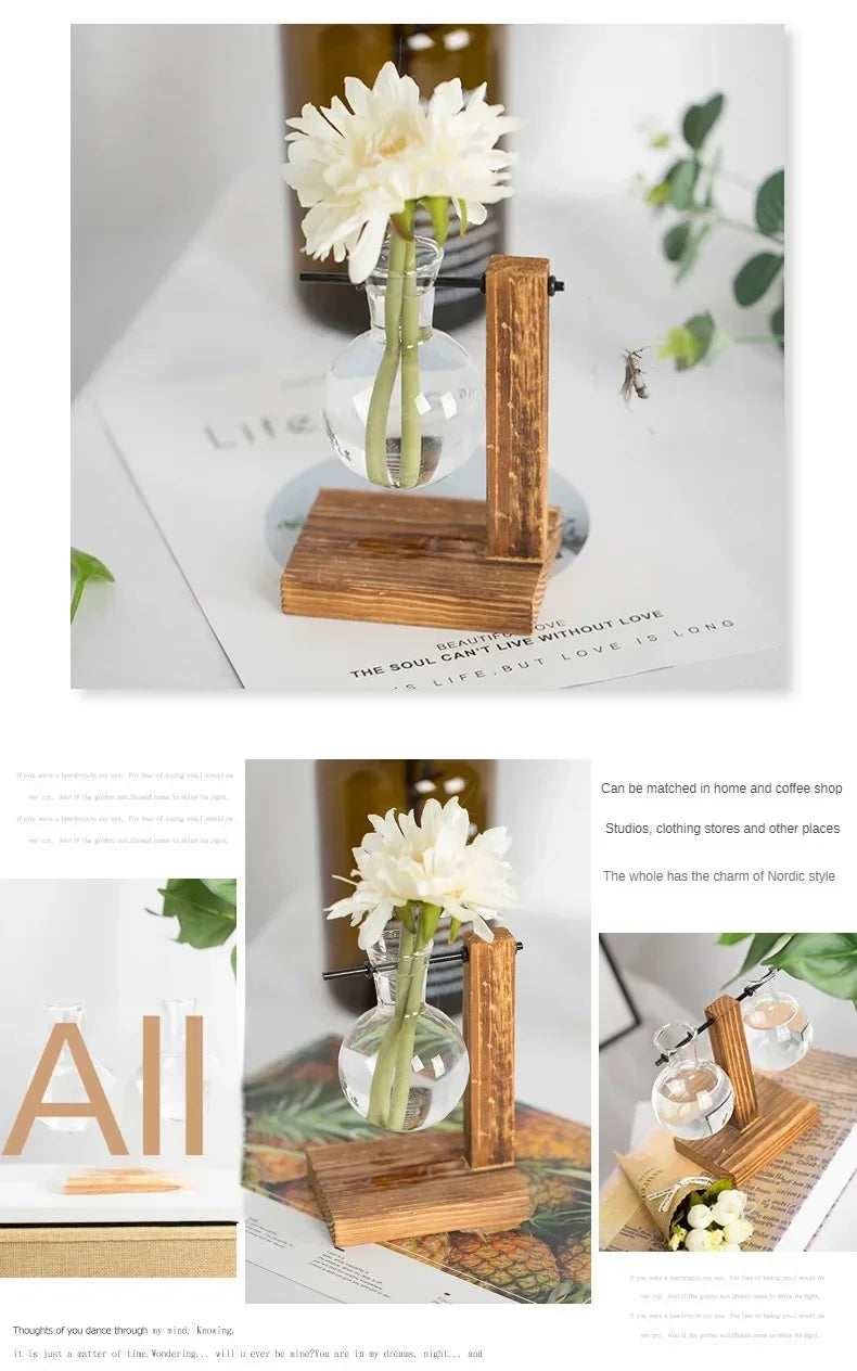 A clear glass vase holds a white flower in a wooden stand on a white background.