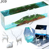 A rectangular resin landscape ornament featuring a forest, water, and deer figures.