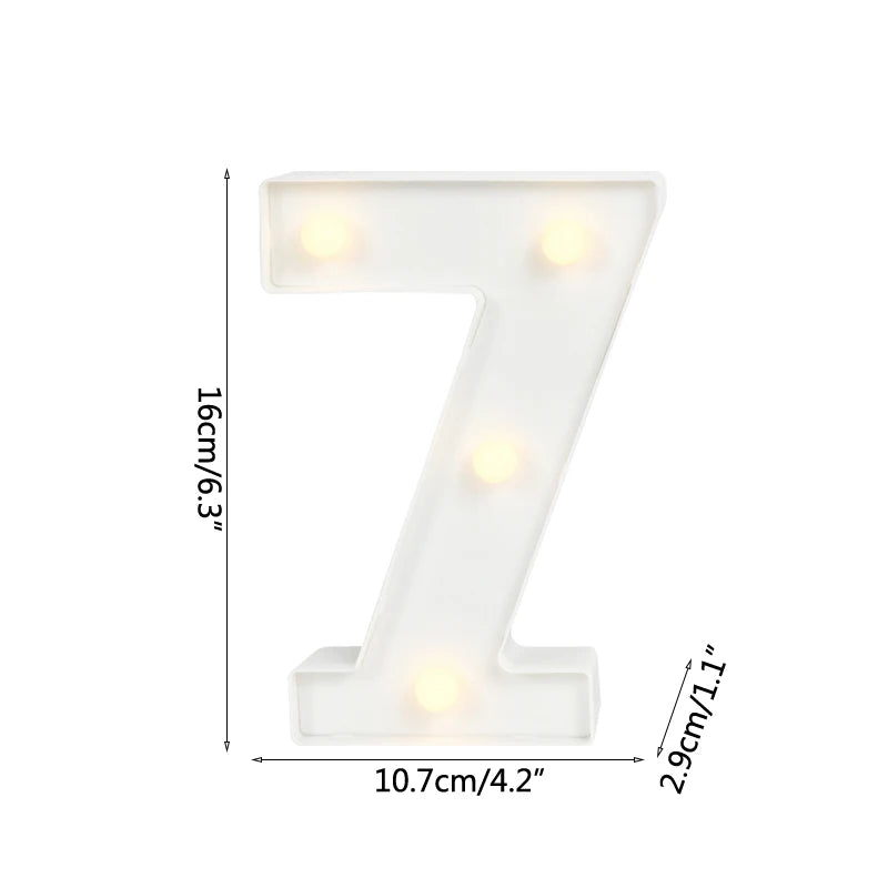 A white alphabet letter light shaped like the number seven with warm white LED lights.