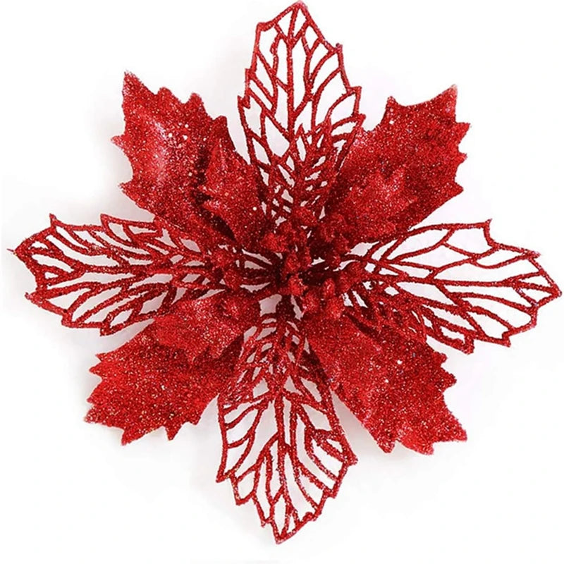 A red glittery artificial Christmas flower with a delicate, intricate lace-like design.