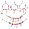 A set of silver and pink beads, charms, and findings for a DIY bracelet making kit.