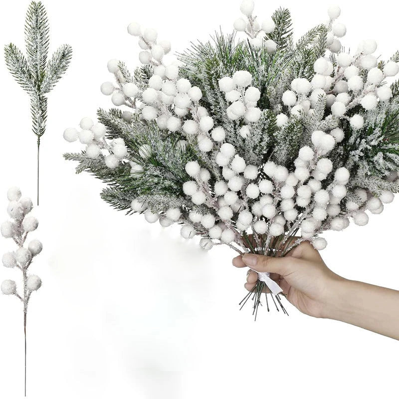 A hand holds a bouquet of frosted pine needles and white berries for a Christmas arrangement.