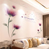 Wall stickers featuring watercolor illustrations of purple and pink roses on a white wall.