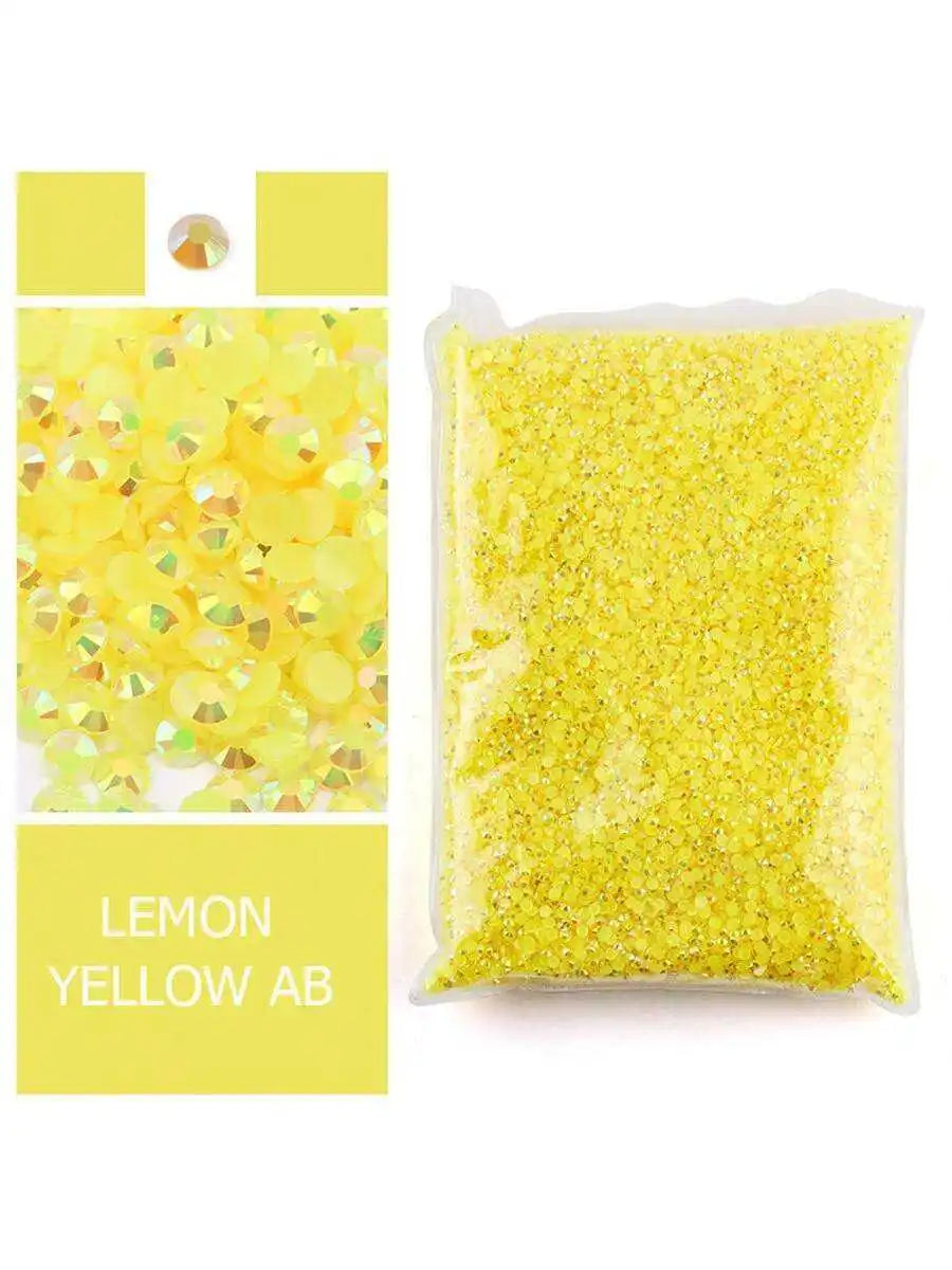 Bag of lemon yellow glitter resin with gold rhinestones