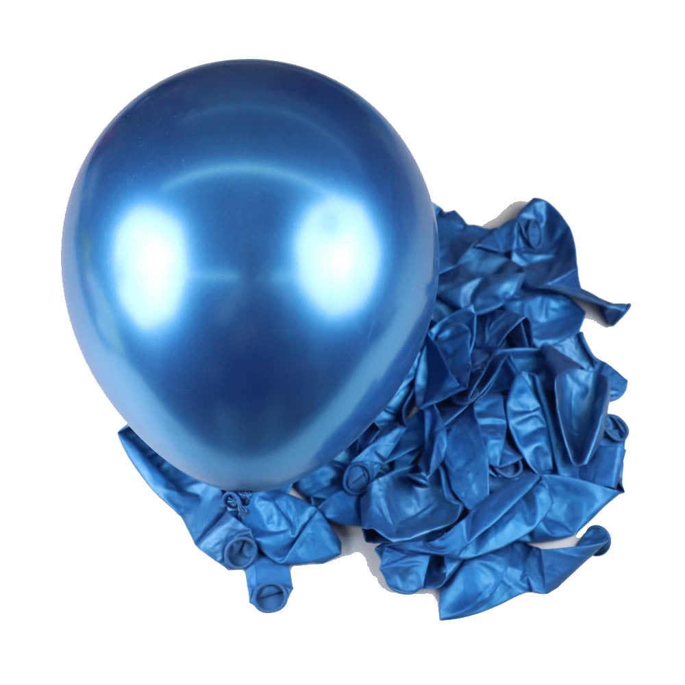 A single shiny blue latex balloon resting on a pile of crumpled blue foil balloons for party decor.