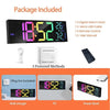 A large digital wall clock with an RGB mood light and accessories including a USB cable remote control and user manual.