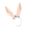 A pair of light pink and white faux fox ears headband for cosplay or themed parties.