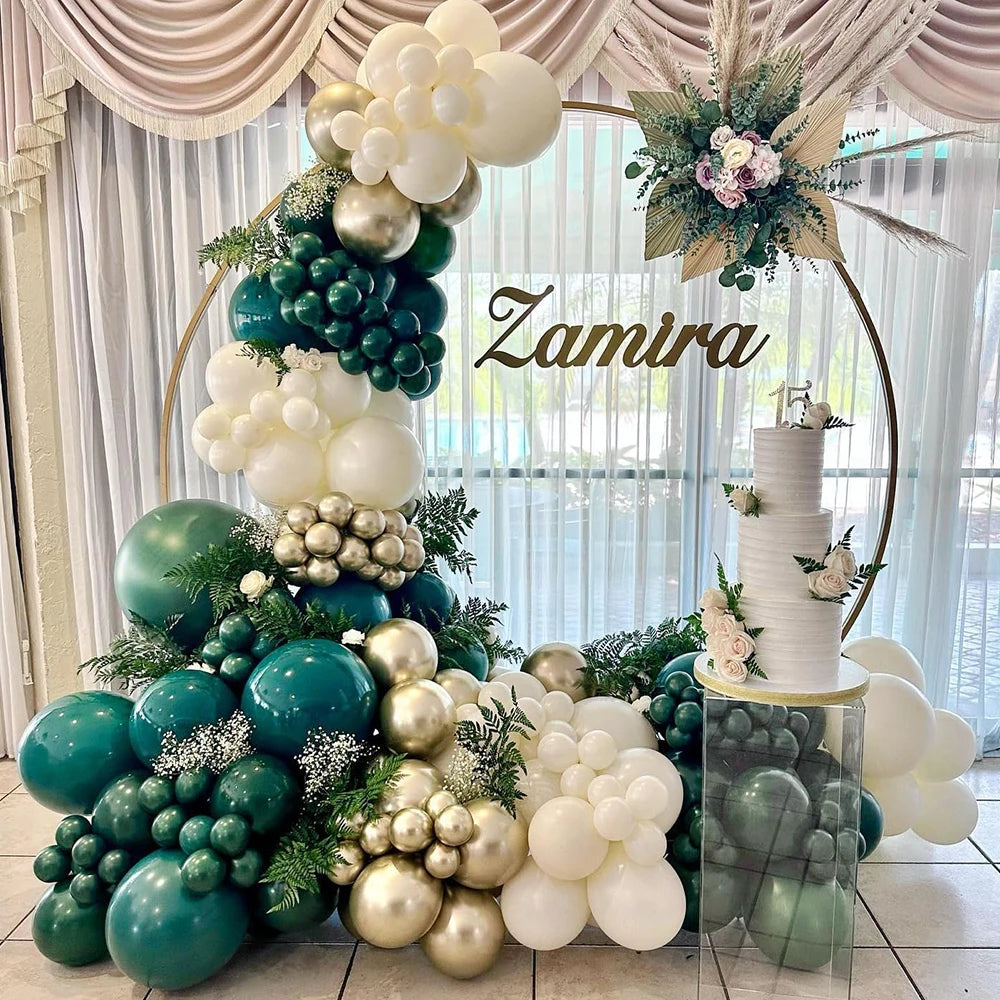 A floral balloon arrangement featuring green and white latex balloons for party decor.