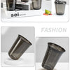 A set of disposable U-shaped coffee cups in black glass are displayed on a white surface.