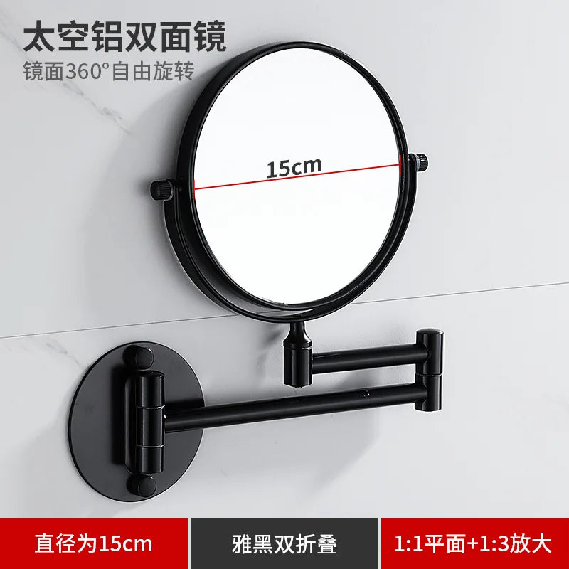 Black folding double-sided wall mirror with telescopic arms, 15cm diameter.