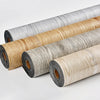 Rolls of 3D textured wood grain self-adhesive flooring film in various natural wood tones