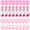 A collection of pink and iridescent latex balloons filled with confetti for party decorations