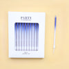 A white box labeled Party Candles containing a set of clear blue candles and an applicator stick.