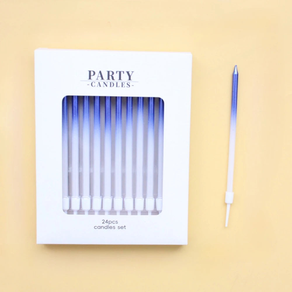 A white box labeled Party Candles containing a set of clear blue candles and an applicator stick.