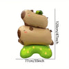 A standing foil balloon decoration shaped like a capybara with a turtle on its back.