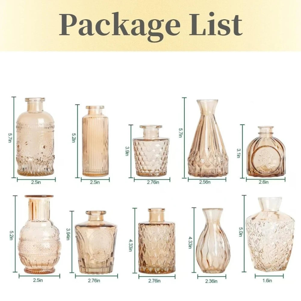 A collection of faceted glass bud vases in various shapes and sizes for home decor.