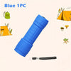 Blue 1PC compact flashlight with a black lanyard and various camping items shown around it.