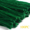A bundle of green chenille stem pipe cleaners for DIY crafts, shown in a close-up view.