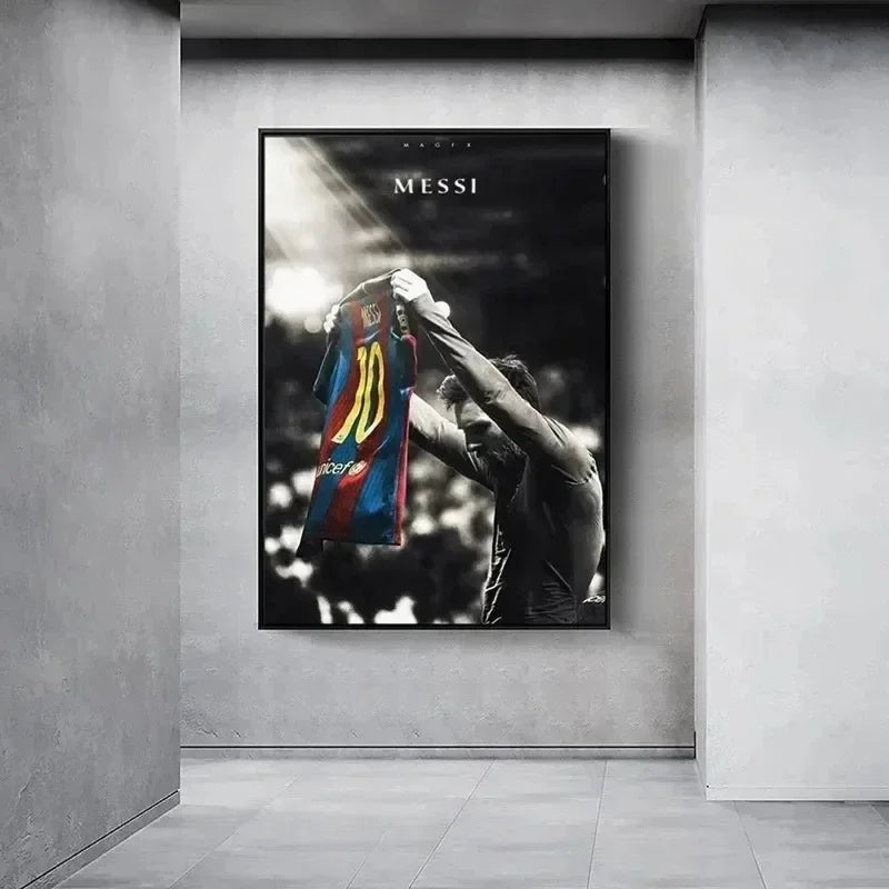 A canvas print featuring a black and white photo of Lionel Messi celebrating a goal.