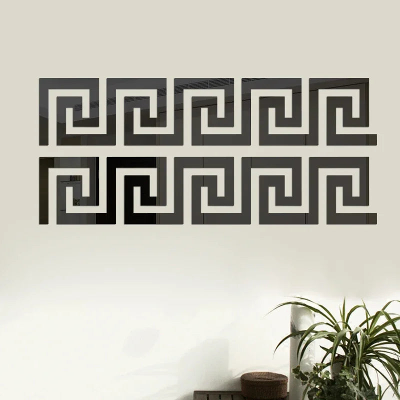 A set of black self-adhesive 3D acrylic mirror wall stickers featuring a repeating geometric maze pattern.