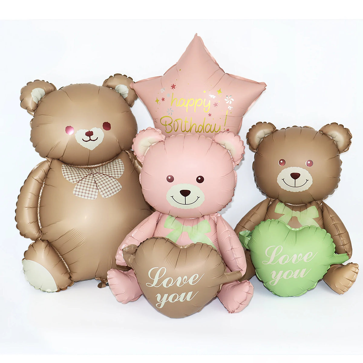 Three matte 3D heart love you bear foil balloons in pink, brown, and green.