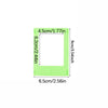 A rectangular magnetic mini photo frame in lime green plastic with dimensions 4.5cm x 6.2cm and a depth of 9cm.