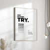 A framed canvas print with black text that reads Just FuKing Try Focus Focus Focus Focus Focus Even if you fail you still can