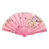 Pink vintage lace hand fan with floral embroidery, shown open and angled.